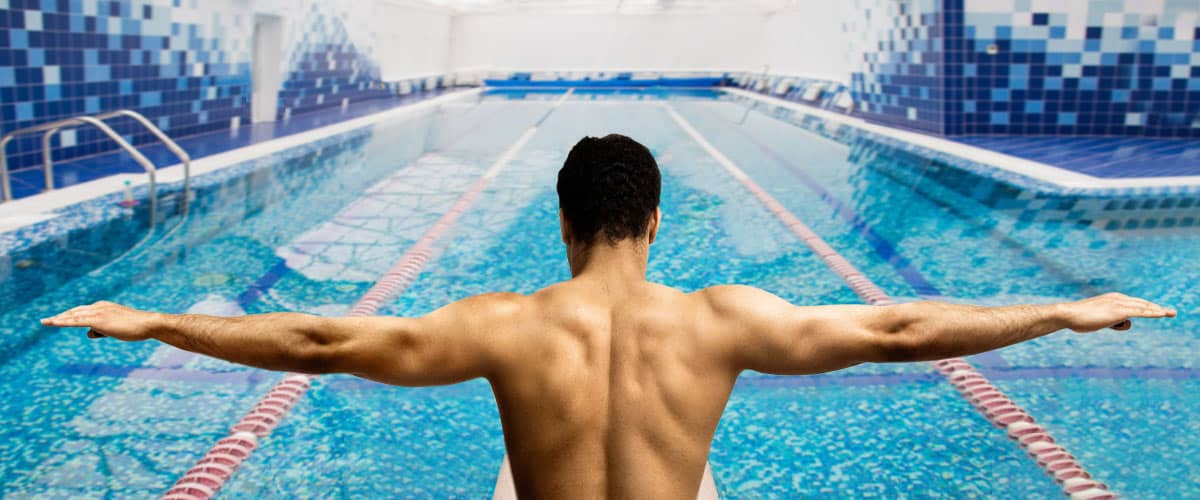 man preparing to swim laps